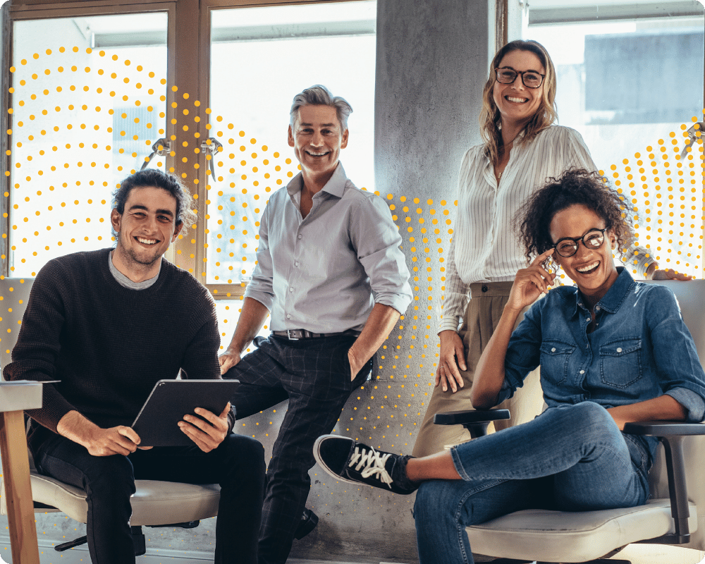 A happy team of professionals in an office space