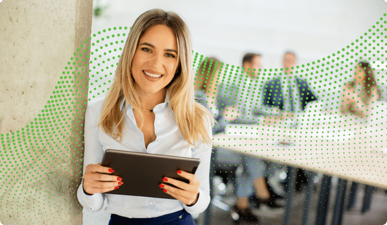 Female legal professional on tablet in front of team in an office